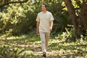 Adult enjoying a peaceful outdoor environment to support mental recovery and focus.